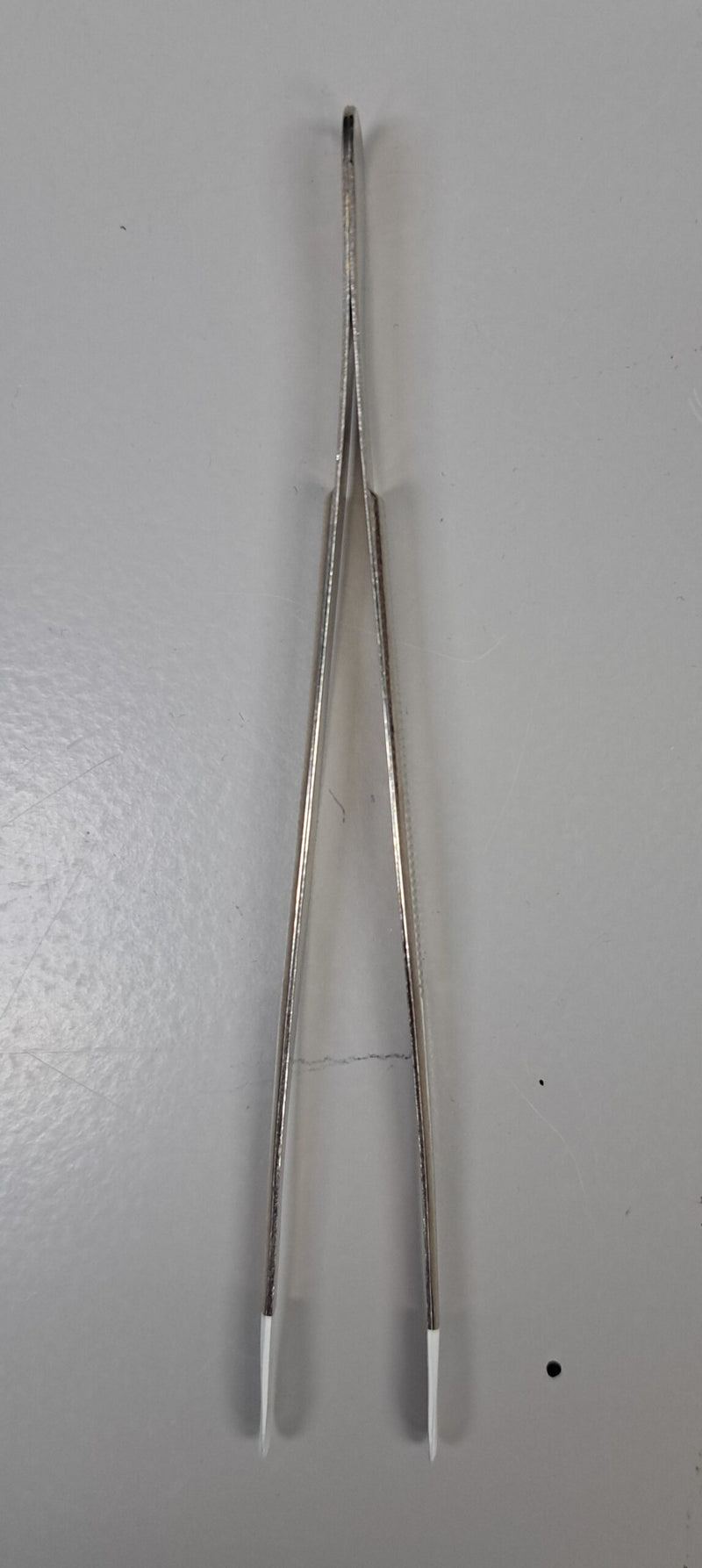 COIN TONGS image 0