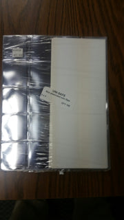 UNI-SAFE non-plasicized coin flips - 2" x 2" image